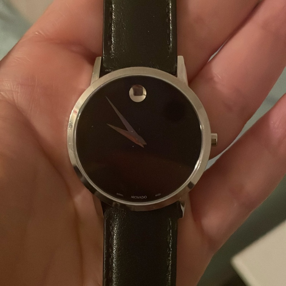 Black and silver movado watch
